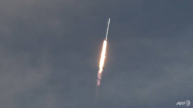 spacex launches lands recycled rocket