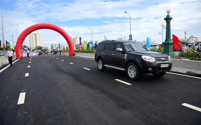 new bridge opens in hcm citys district 8