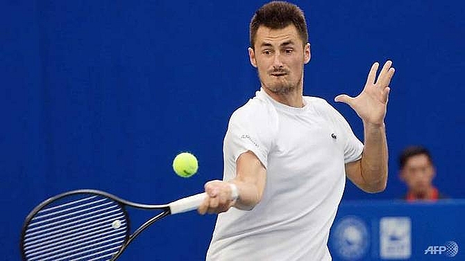 australian firebrand tomic wins first title in three years