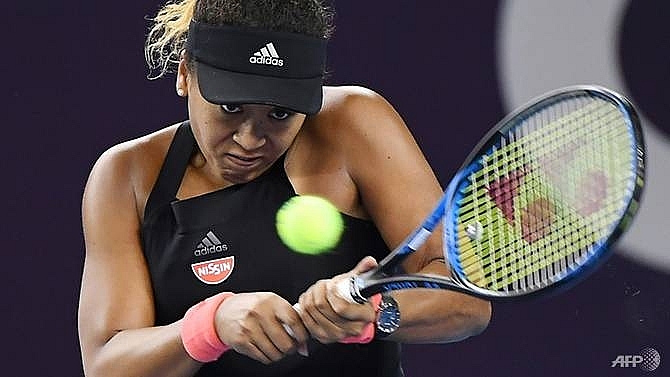 emphatic osaka powers into china open round two