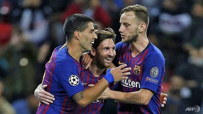 messi rakitic light up wembley as barcelona sink spurs