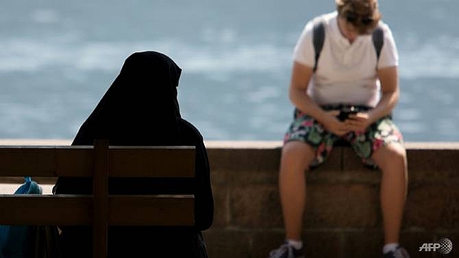 enforcing austrias burqa ban a delicate matter in alpine resort