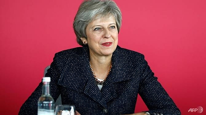 uk pm faces backlash over brexit compromise