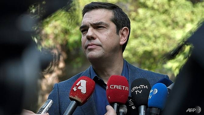 greek pm urges macedonia to ratify name deal after losing foreign minister