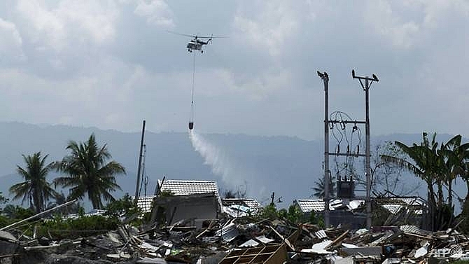 indonesia drops disinfectant on quake hit palu