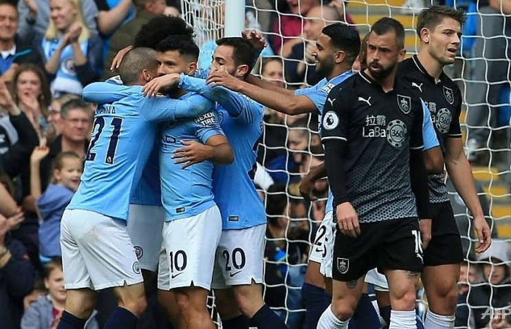 Man City turn on style as Salah fires Liverpool to win