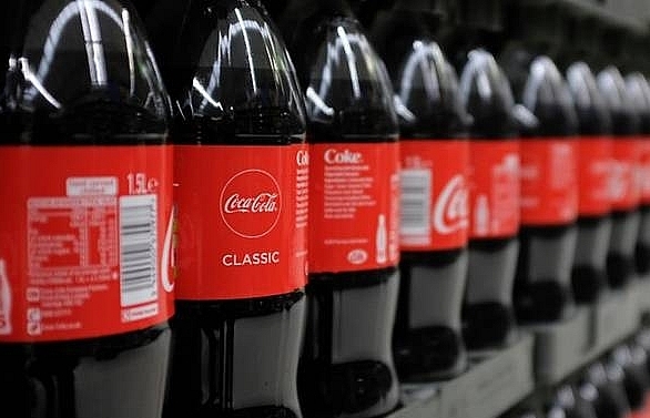 Father of 2 jailed in France for feeding them Coca-Cola