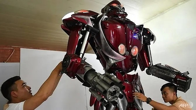 vietnamese roll out transformers inspired robot with green message