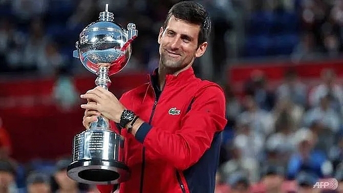 djokovic downs millman to win his first japan open title