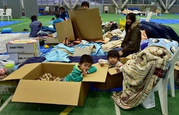 58 dead, rescuers in 'day and night' hunt for missing after Japan typhoon