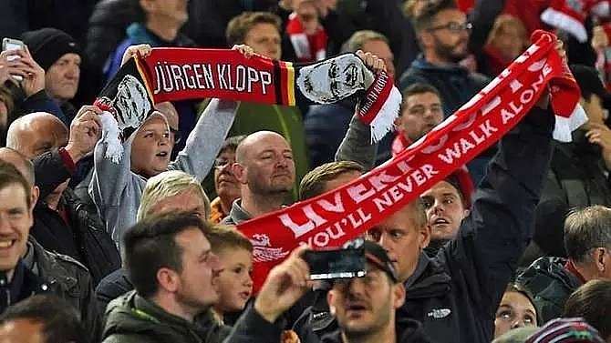 uefa fine liverpool man city for fan misconduct