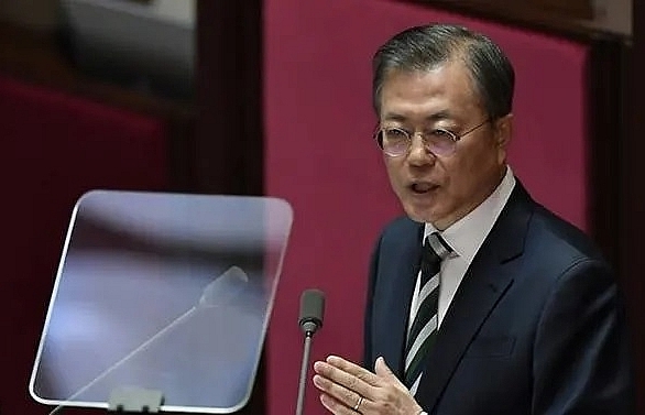 South Korea's Moon ups defence spending, urges North to talk