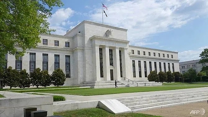 us fed lowers key interest rate a third time