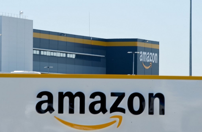 amazon says nearly 20000 of its workers got covid 19