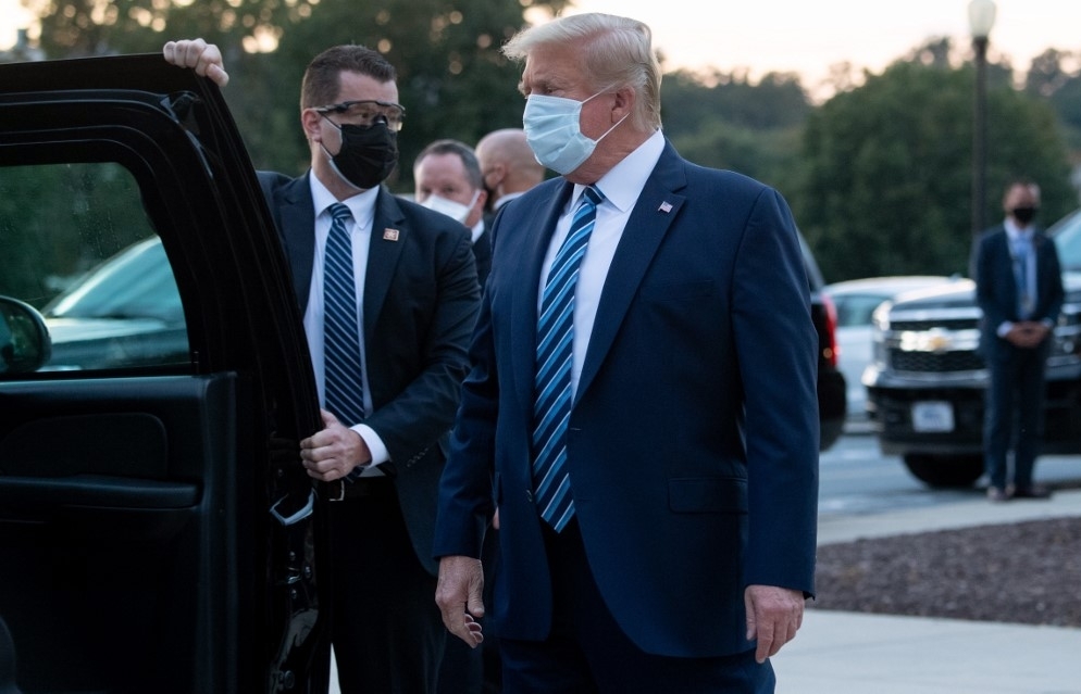 Trump leaves hospital for White House -- removes mask immediately