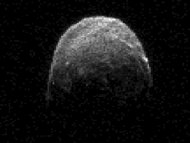 Large asteroid nears Earth for rare fly-by