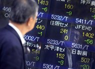 japanese shares fall 247 pct in early trade