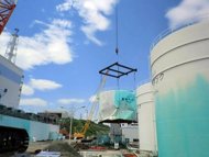 tepco to sell 24 bn kddi stake for nuclear payout