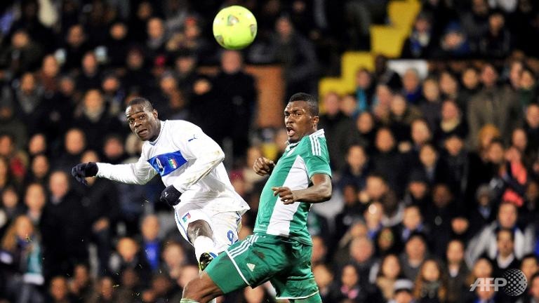 italy nigeria share spoils in frantic friendly