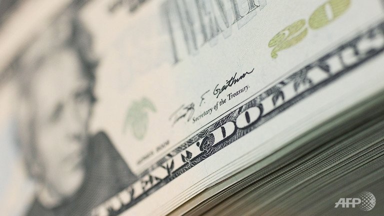 dollar slips on lower consumer confidence