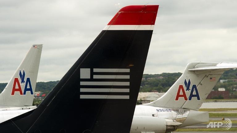 american us airways see merger closing on dec 9