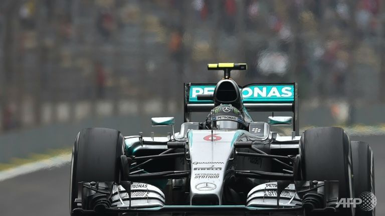 rosberg roars back to top brazil practice