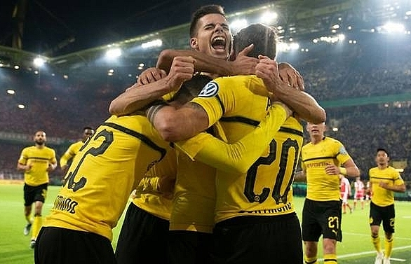 Reus' extra-time penalty gives Dortmund German Cup win