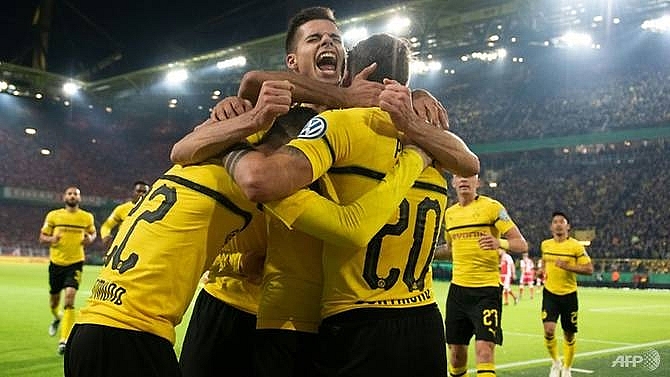 reus extra time penalty gives dortmund german cup win