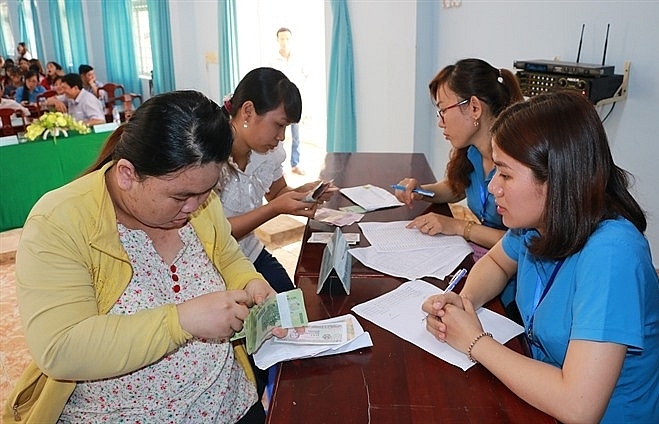 Vietnamese workers in a bind as underperforming enterprises stalled insurance payment