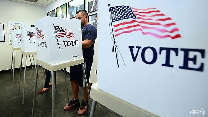 americans start voting in mid term verdict on trump rule