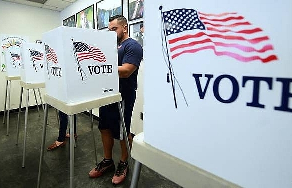 Americans start voting in mid-term verdict on Trump rule