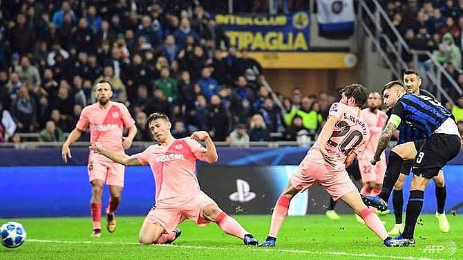 barcelona through to champions league last 16 after inter draw