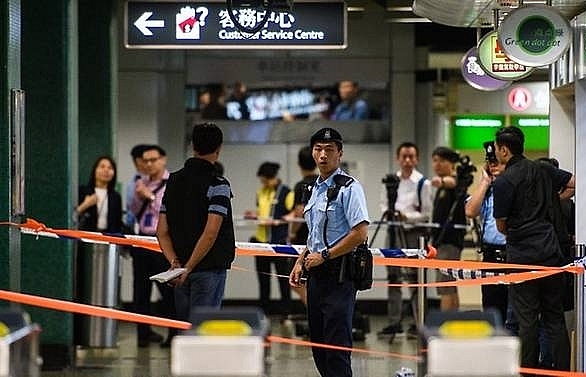 police shoot knifeman in hong kong mtr station