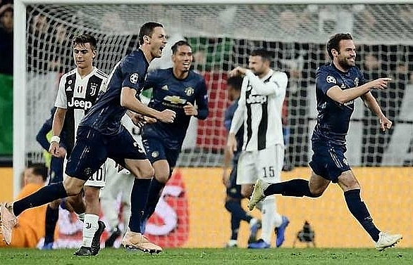 Ronaldo scores but Man United stun Juve with two late goals