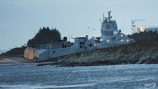 race to stop norway frigate sinking after oil tanker collision