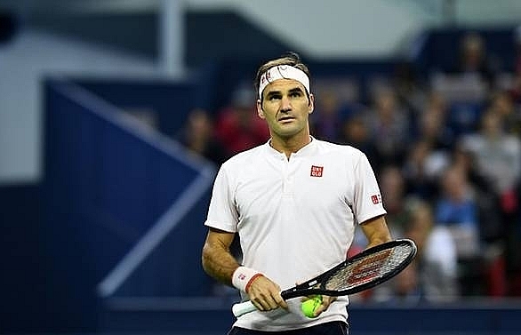 Australian Open director Tiley defends Federer scheduling