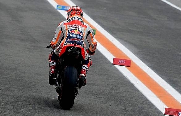 Marquez defies injury to qualify fifth for Valencia MotoGP