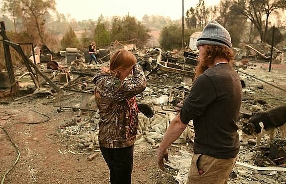 Victims mourned as toll hits 77 in California wildfire