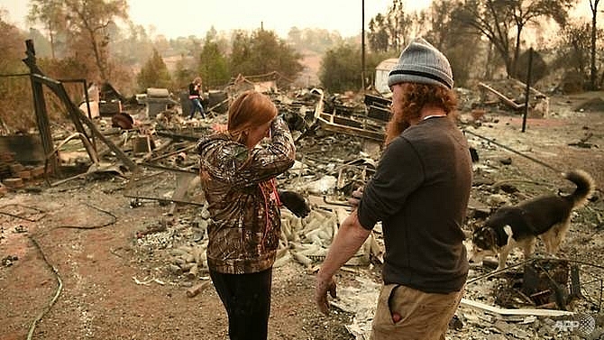 victims mourned as toll hits 77 in california wildfire