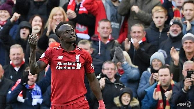 mane signs new long term deal with liverpool