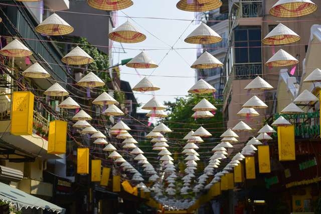 conical hat street in hanoi old quarter