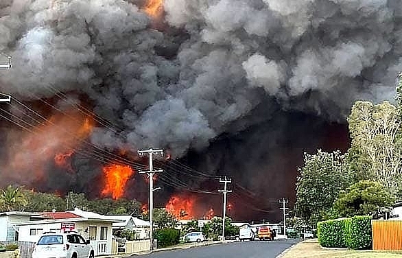 Two dead, at least 150 homes lost in Australia bushfires