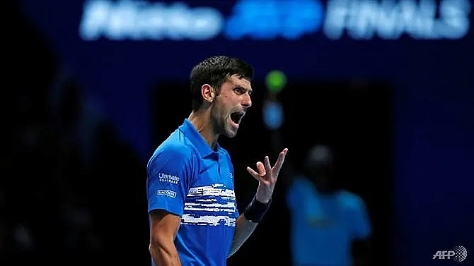 djokovic romps to victory in atp finals opener