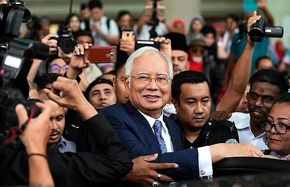 Malaysian court rules former prime minister Najib Razak's 1MDB trial will proceed
