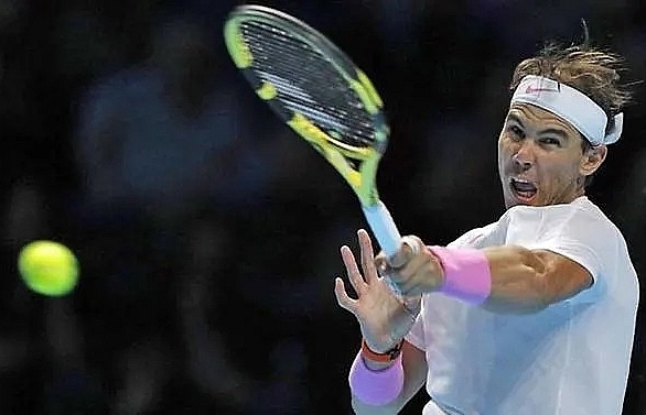 Tsitsipas reaches ATP Finals semis after Nadal thriller