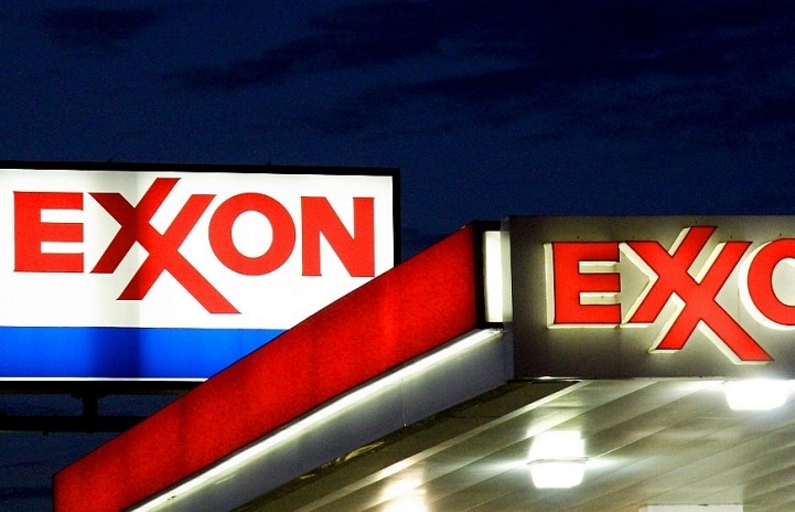 exxon mobil chevron again report losses on low oil prices