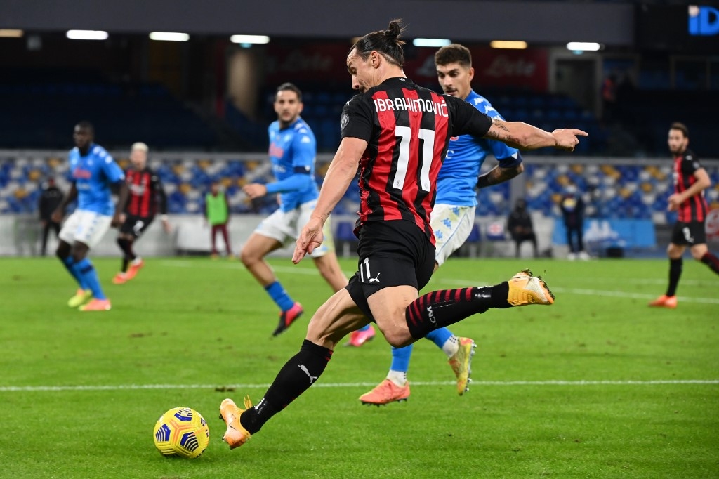 ibrahimovic scores twice limps off as ac milan stay top in serie a