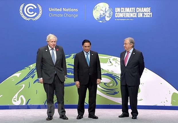 PM Pham Minh Chinh (centre), British Prime Minister Boris Johnson (L), and UN Secretary-General Antonio Guterres at the event. (Photo: VNA)