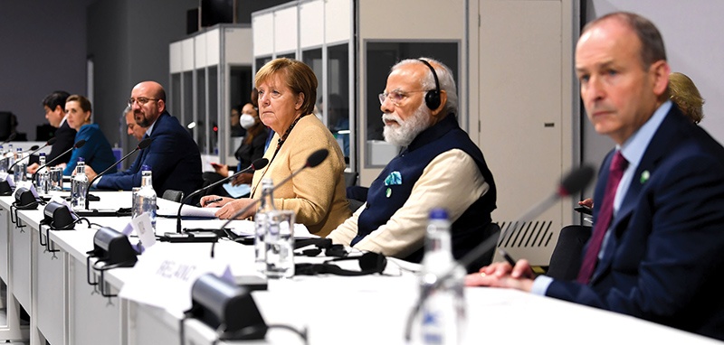 Indian Prime Minister Narendra Modi (second from right) made one of the most crucial pledges at COP26