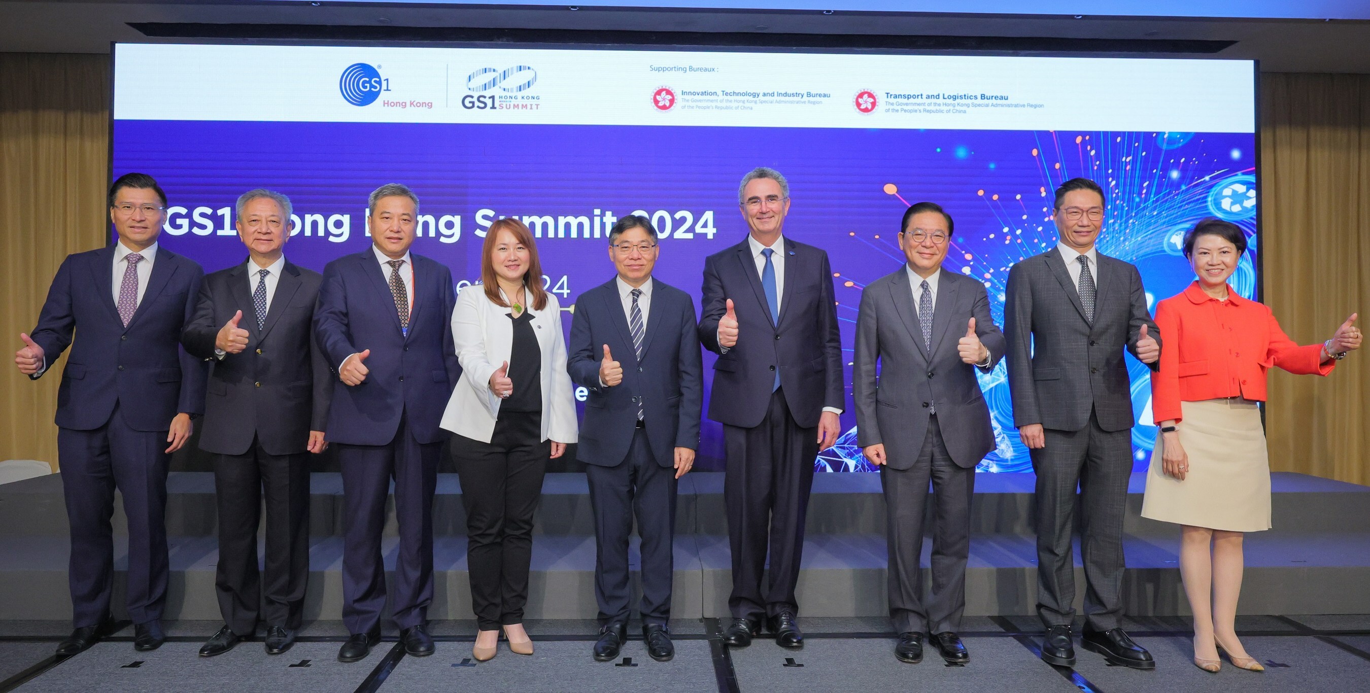 (left to right) Duncan Chiu, Legislative Councillor; Frankie Yick, Legislative Councillor; Zhou Qiang, Deputy Director-General of Economic Affairs & Head of Commercial Office, LOCPG in the HKSAR; May Chung, Chairman, GS1 Hong Kong; Lam Sai-hung, Secretary for Transport and Logistics; Renaud de Barbuat, President and CEO, GS1; Jeffrey Lam, Executive Council & Legislative Councillor; Peter Shiu, Member of the 14th CPPCC National Committee and Legislative Councillor; Anna Lin, CE, GS1 HK